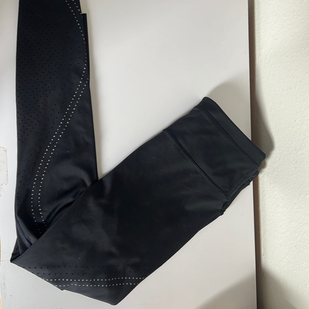 NWT Athleta accelerate laser cut 7/8 tight women's size small in black